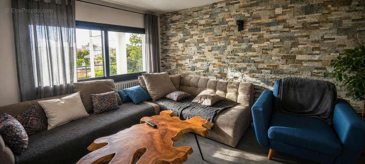 Maison de 10 pièces de 180 m² à Cholet - photo 5