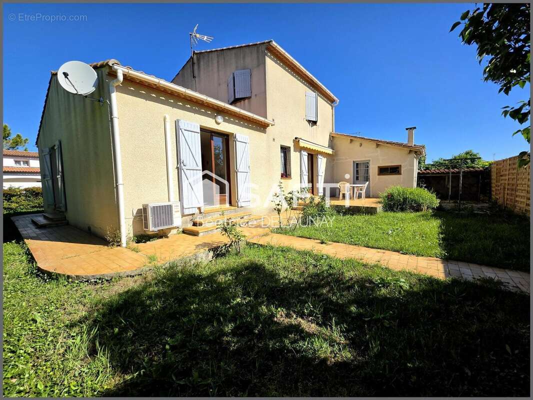 Photo 2 - Maison à SAINT-LAURENT-D'AIGOUZE