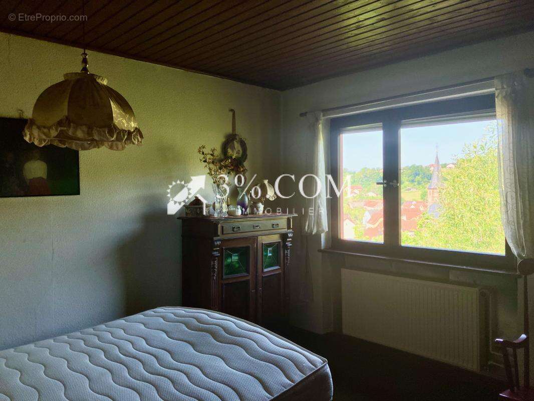 Maison sur les hauteurs avec terrain boisé - photo 13