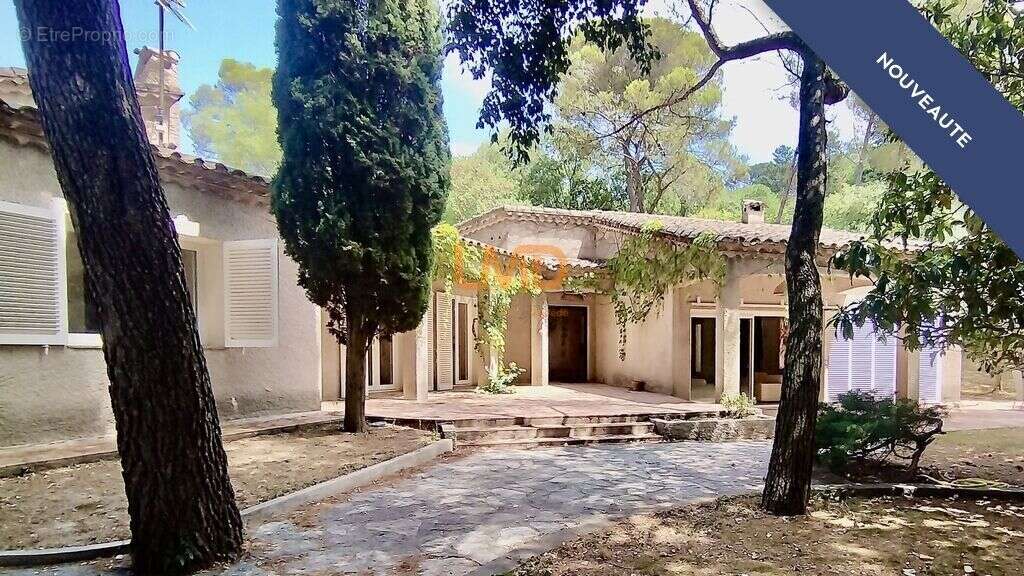 adresse d'exception-villa plain pied-parc arboré-beaux volumes - photo 2