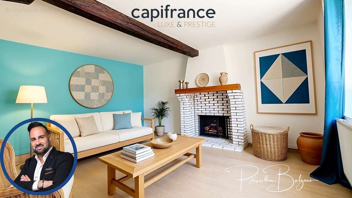 Maison à vendre 4 pièces SAINT GENIS LES OLLIERES (69) – Le charme d'une maison de village avec cour intimiste, garage et vie à  - photo 2