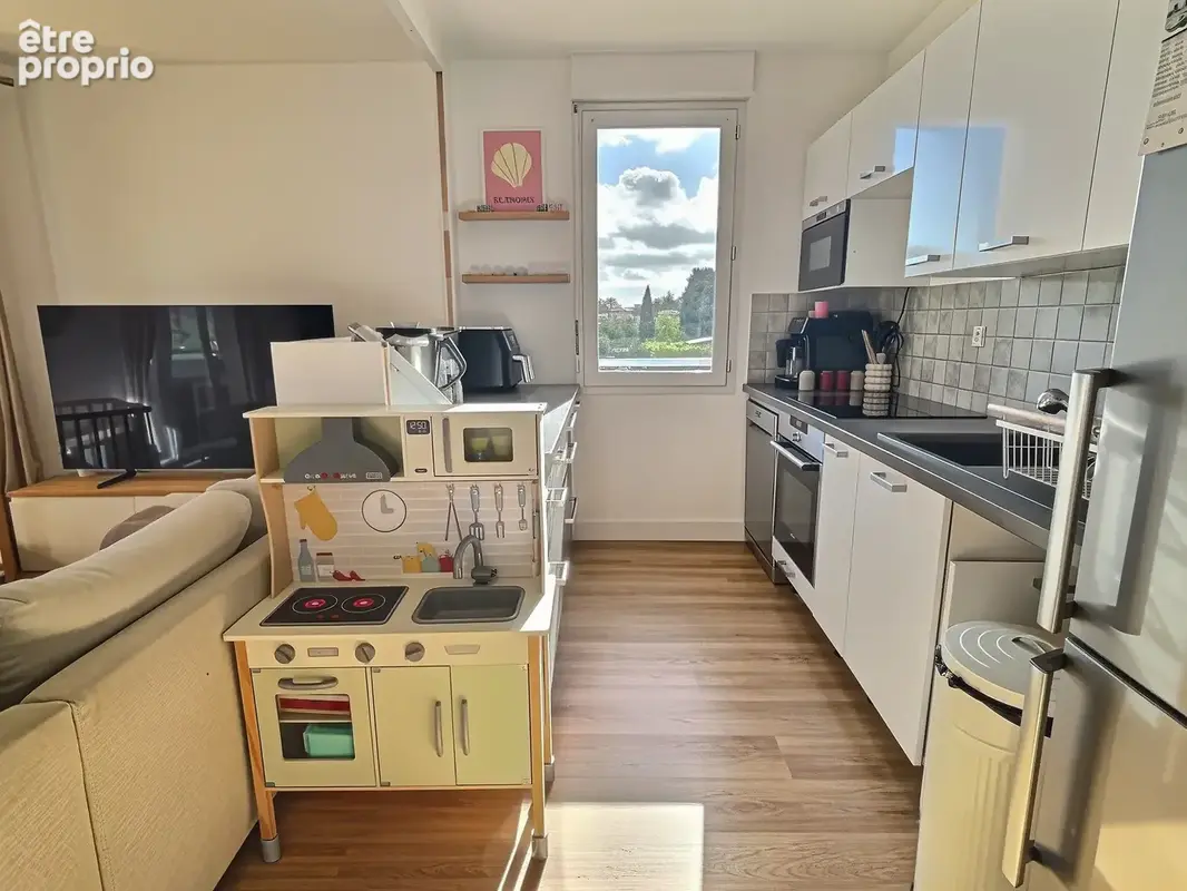 Appartement T3 avec terrasse et 2 stationnements privatifs - photo 3