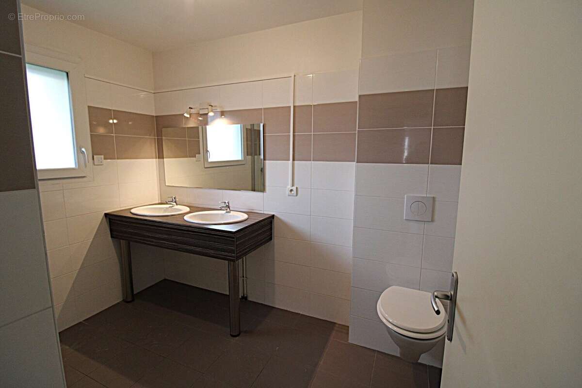 Maison 118 m² à Langueux  - photo 7