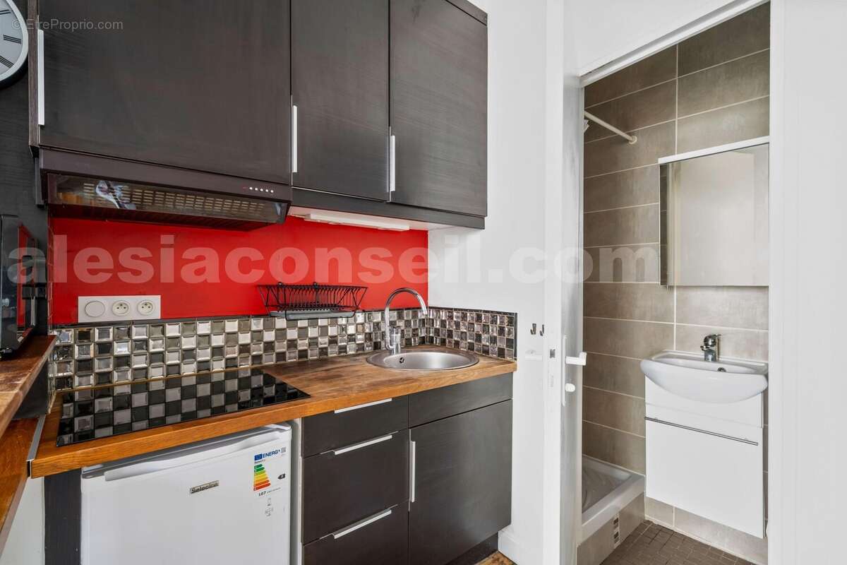 Photo n°2 - Appartement à PARIS-14E