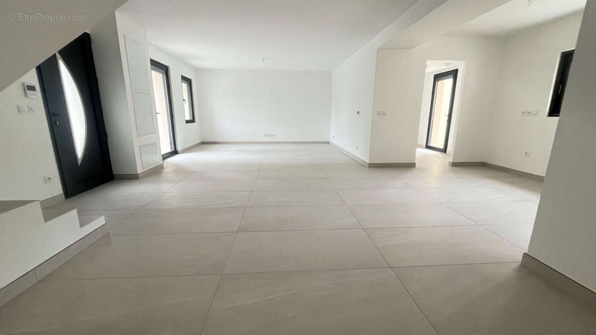 Maison à PONT-EVEQUE