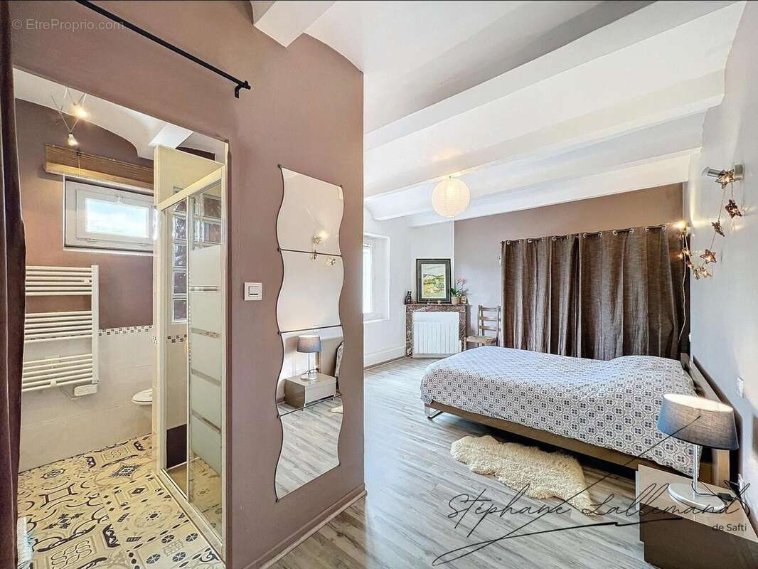 Photo 6 - Maison à SAINT-JULIEN-LES-ROSIERS