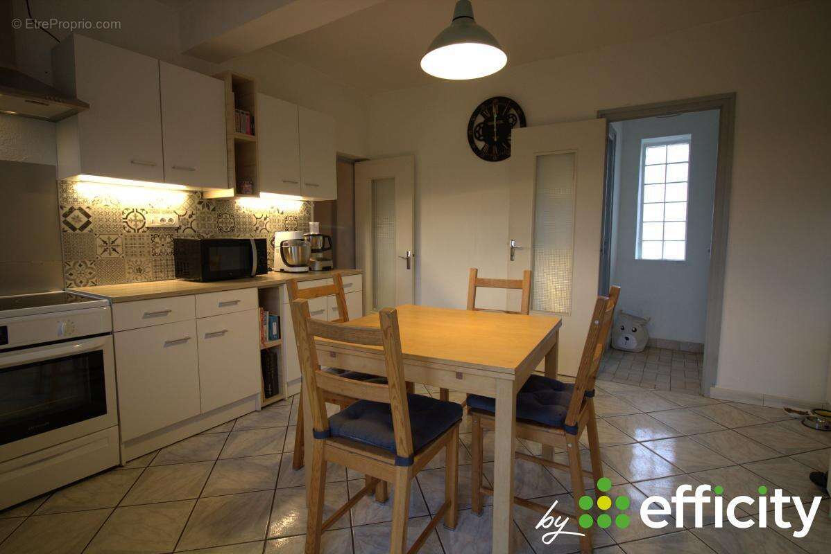 Maison à SOURCIEUX-LES-MINES