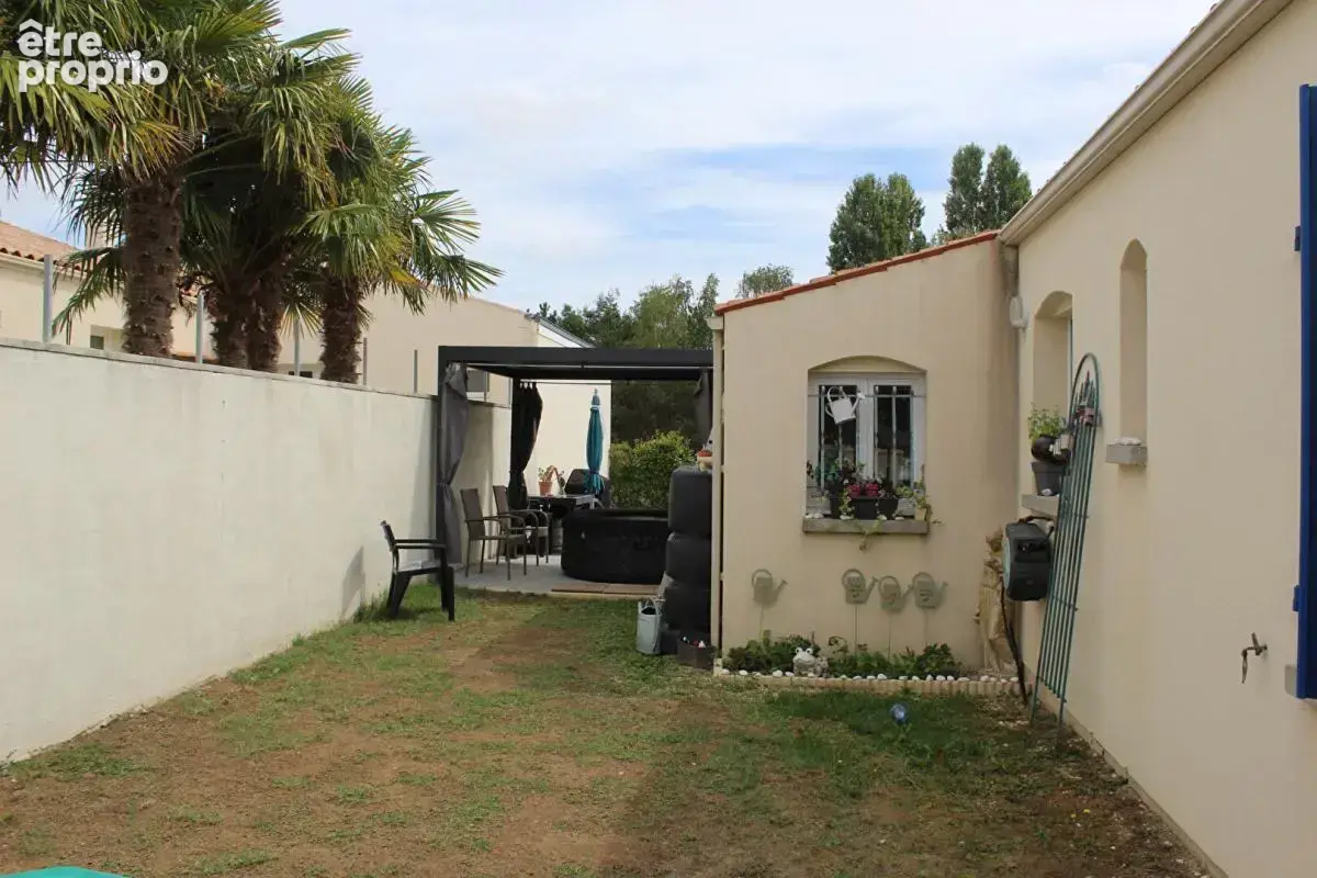 Maison de 110m² avec 3 chambres, véranda et garage à Saint Romain De Benet 289 000 - photo 18