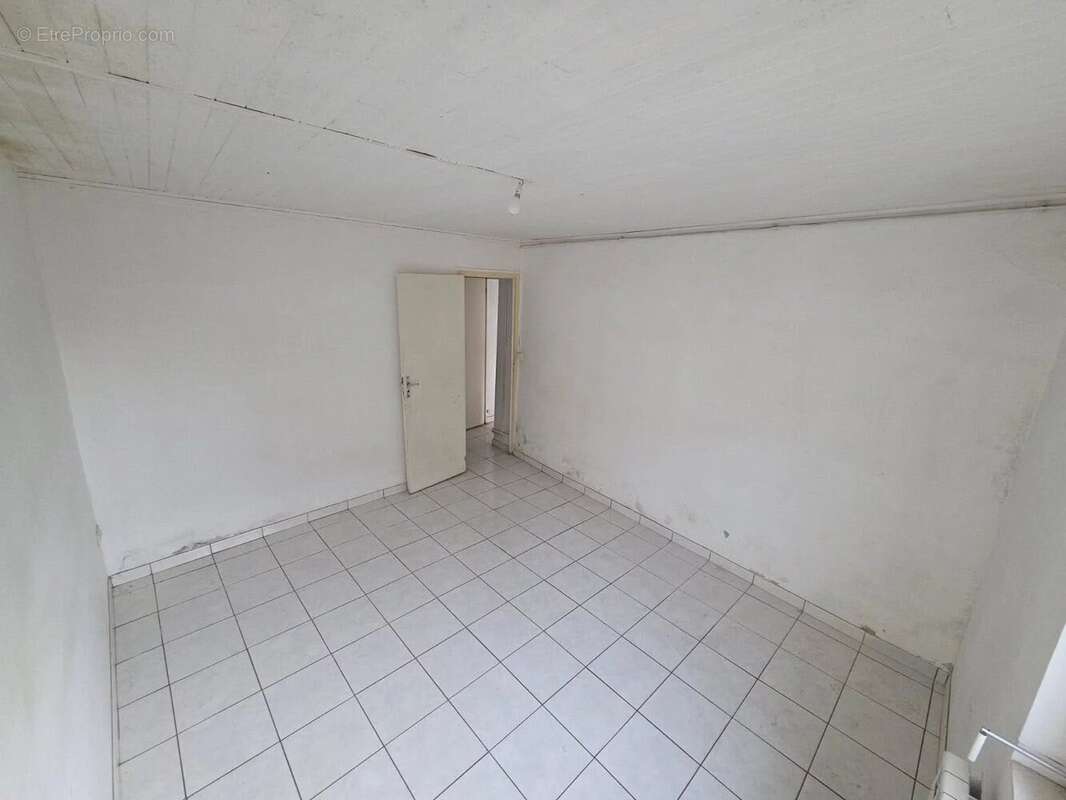 Maison à VILLIEU-LOYES-MOLLON