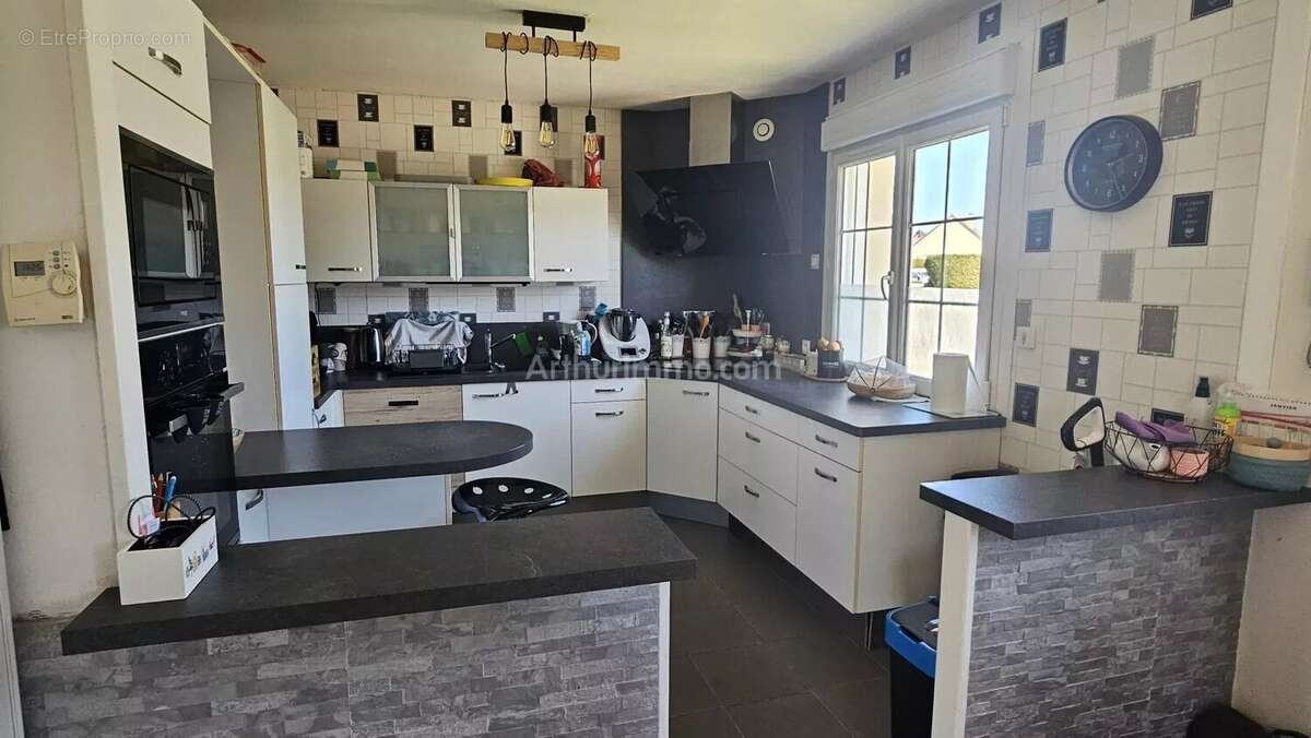 Maison à DEMOUVILLE