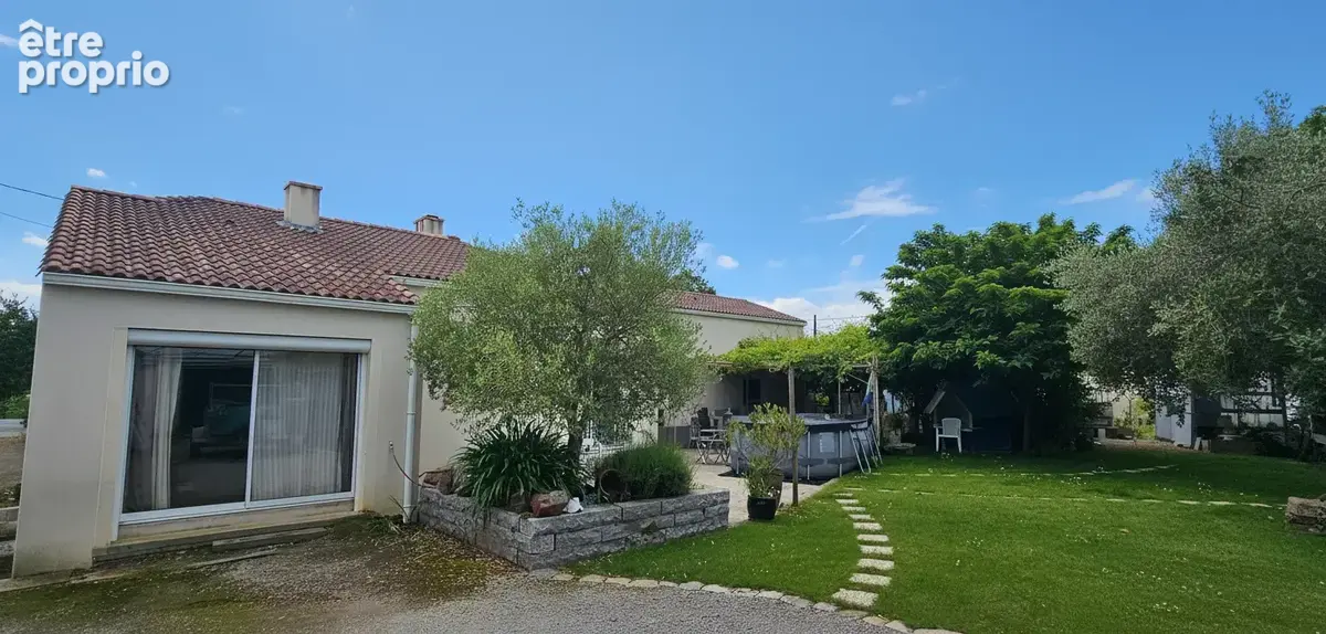 Rare au Pellerin ! Maison de plain-pied DPE B avec vaste salon de plus de 50 m2 et terrain de 1 429 m2 - photo 8