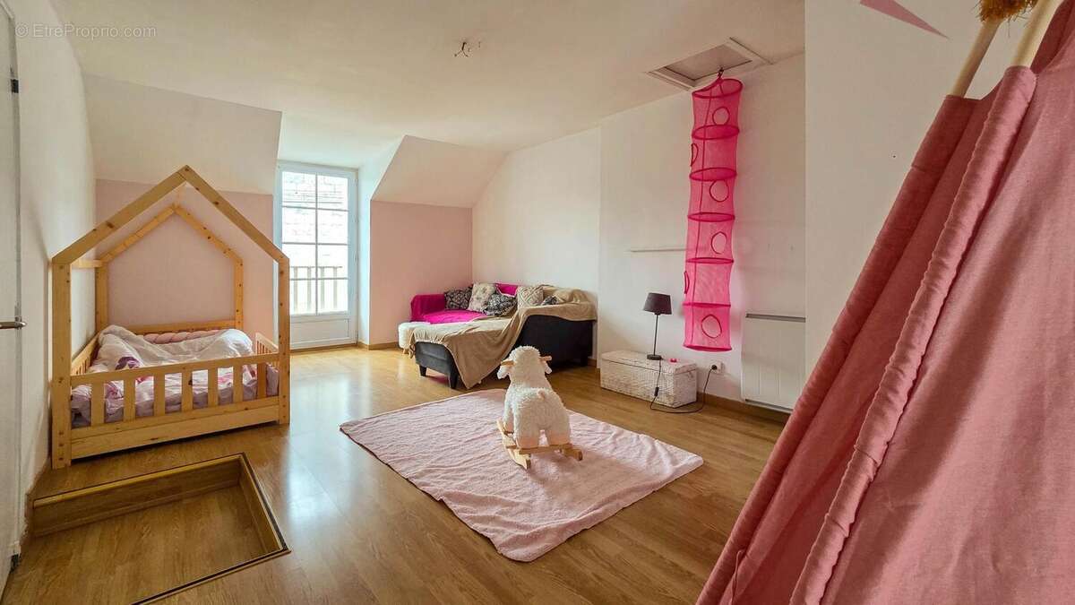 Maison 124 m² à La Breille-Les-Pins  - photo 5