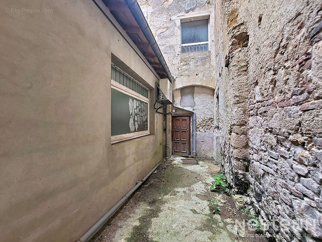 À Vendre Immeuble de rapport avec local commercial de 70 m² et appartement de 84 m² loués au coeur historique de Condom - photo 11