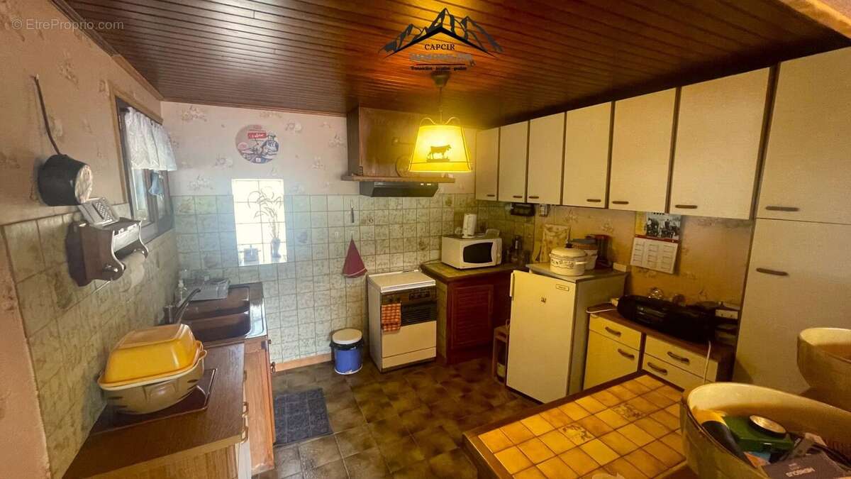 Maison 4 faces en pierre avec jardin - AYGUATÉBIA-TALAU - photo 30