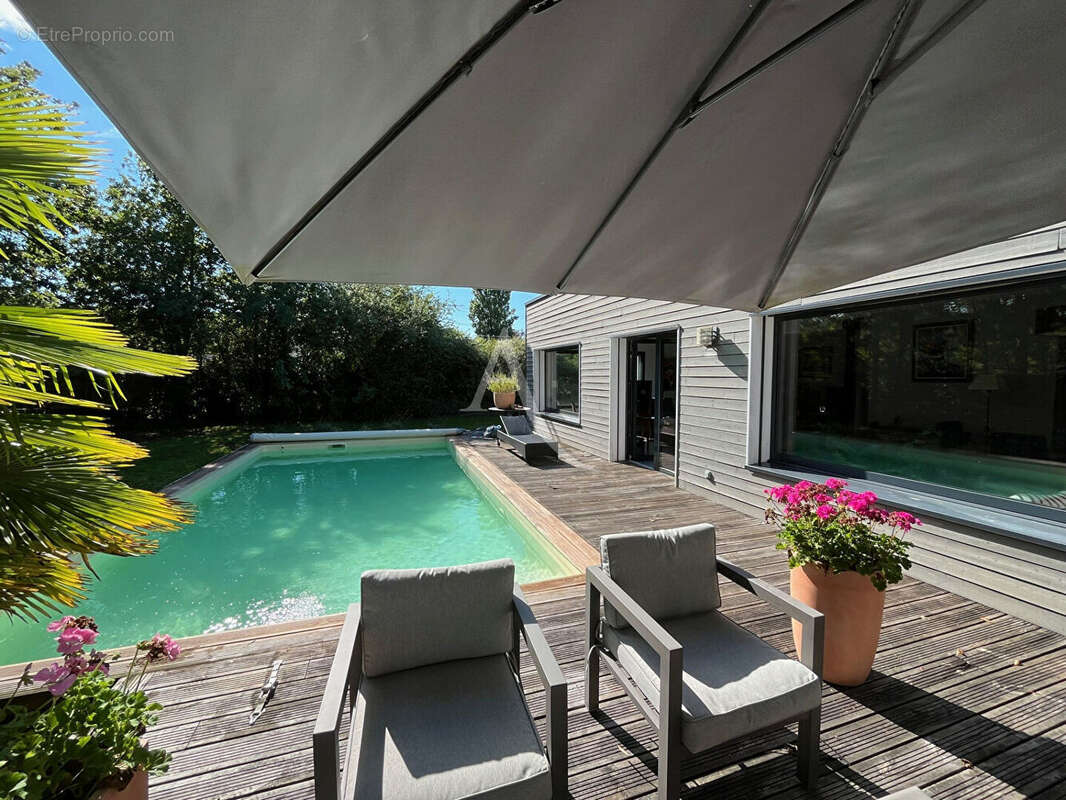 Sologne proche de Ligny le Ribault  BELLE  maison récente avec piscine - photo 6