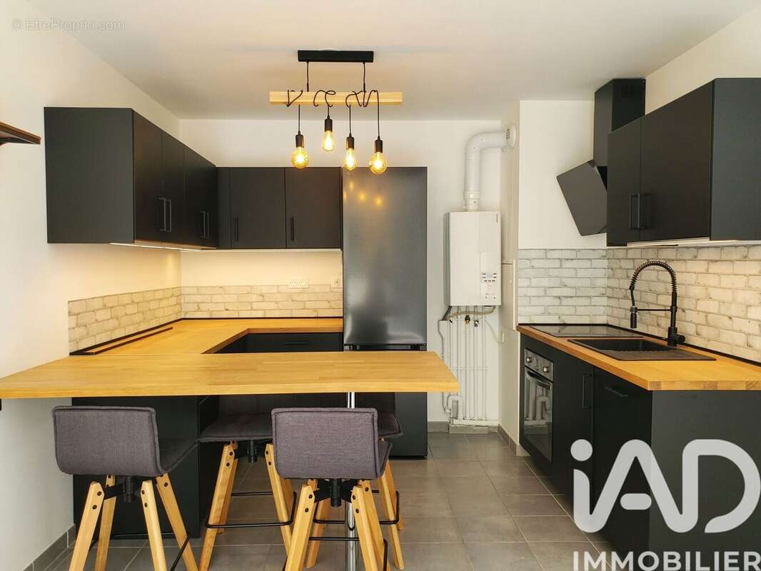Photo 6 - Appartement à VOISINS-LE-BRETONNEUX