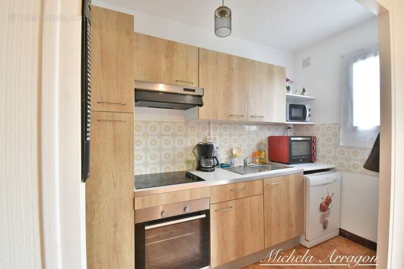Villeneuve-sur-Lot – Appartement T3 plain-pied 82 m² avec grand jardin - photo 5