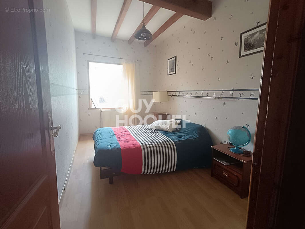 Maison à ESSERTINES-EN-DONZY