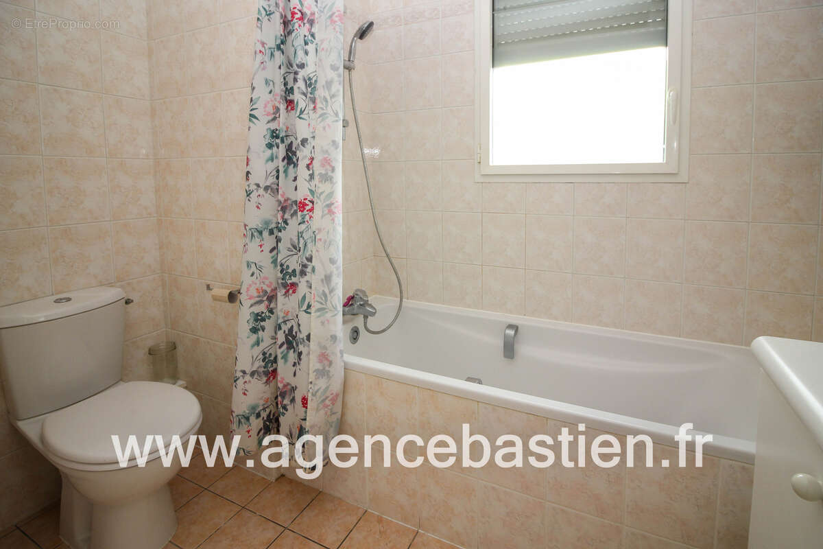 Vente exclusive - t4 de 105 m2 en rez-de-jardin - proche centre-ville - divonne-les-bains - 590.000€ - photo 10