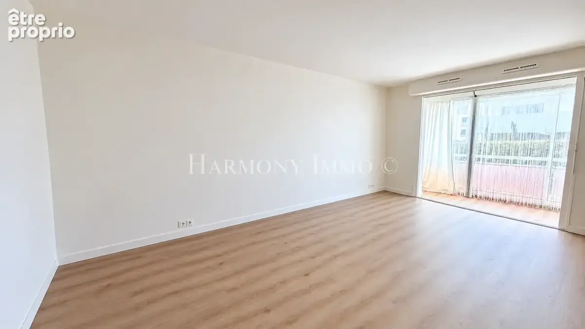 Appartement T2 de 55.43m2 en bon état, proche commerces. - photo 2
