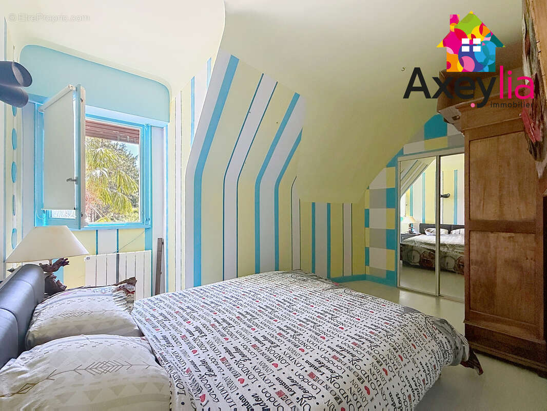 A vendre - commelle-vernay - maison à toit de chaume et semi-enterrée avec quatre chambres, terrain et piscine - photo 11
