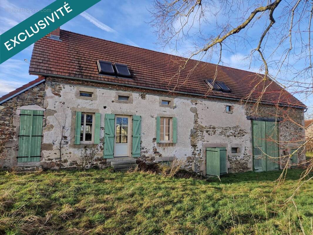 Photo 1 - Maison à ECHASSIERES