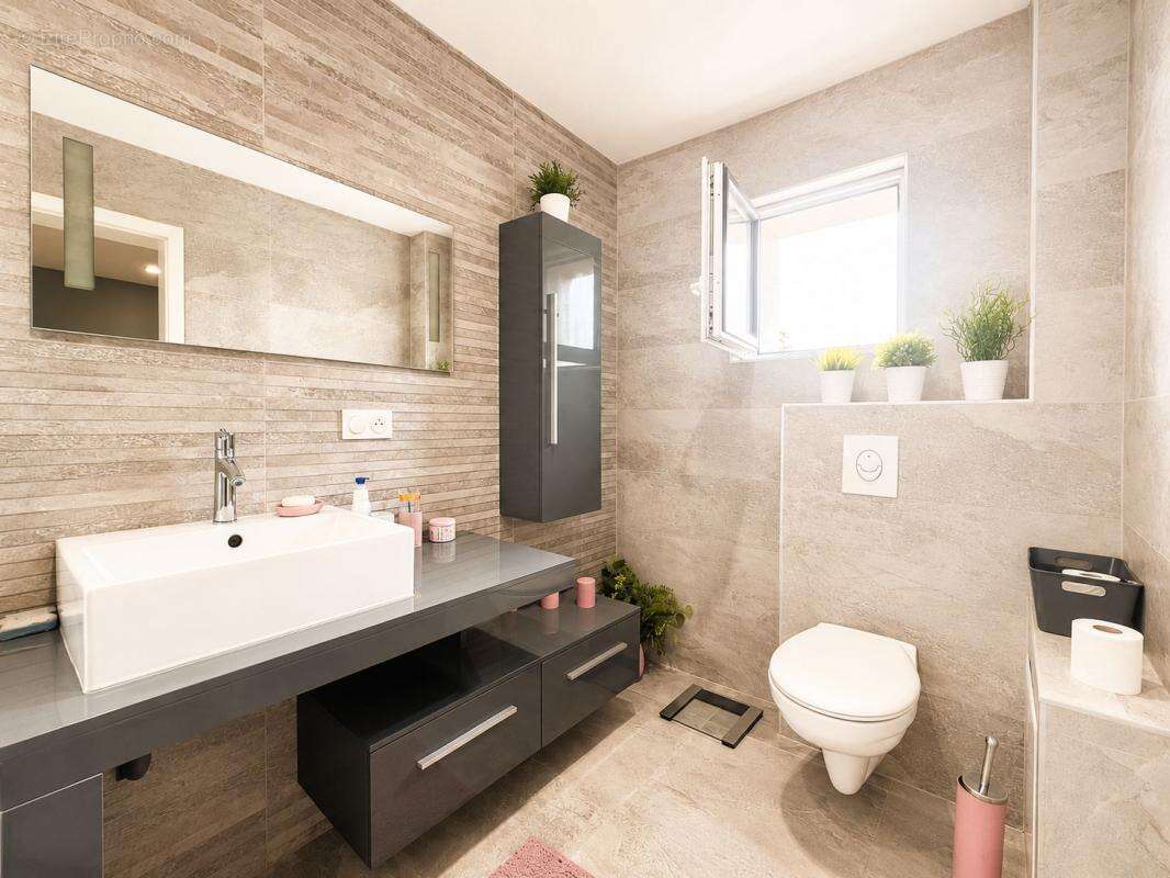Exclusivité à bischheim – maison familiale dpe b – terrasse – sous-sol aménagé – prestations premium - photo 11