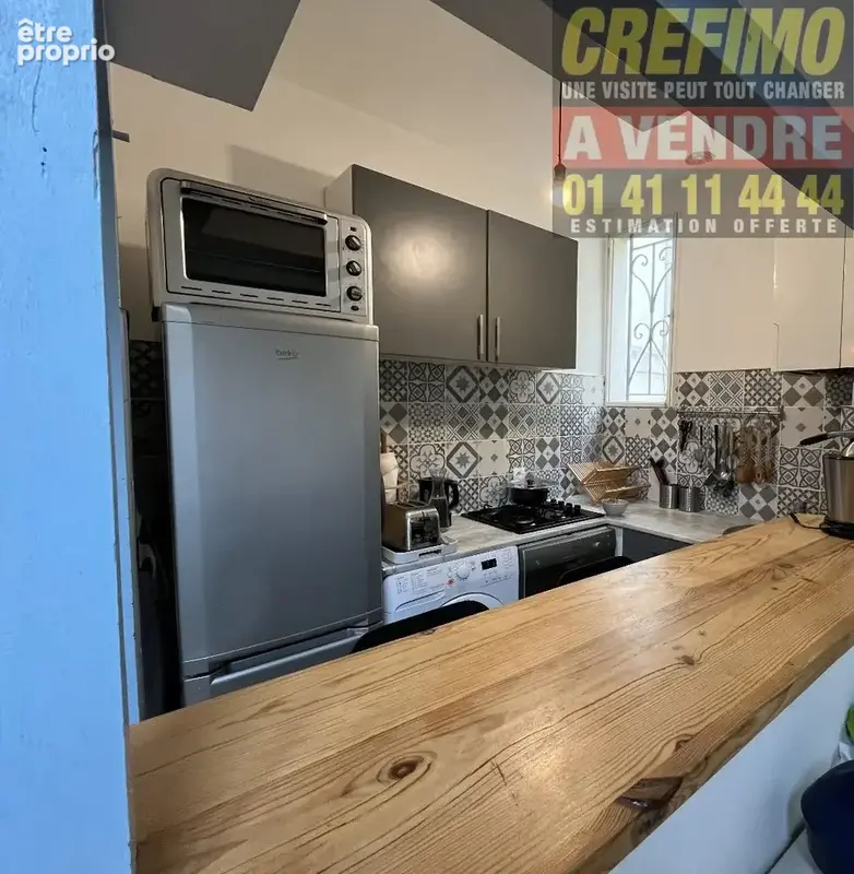 À Asnières-sur-Seine, découvrez une charmante maison de ville lumineuse, idéale pour une vie de famille confortable et pratique  - photo 5