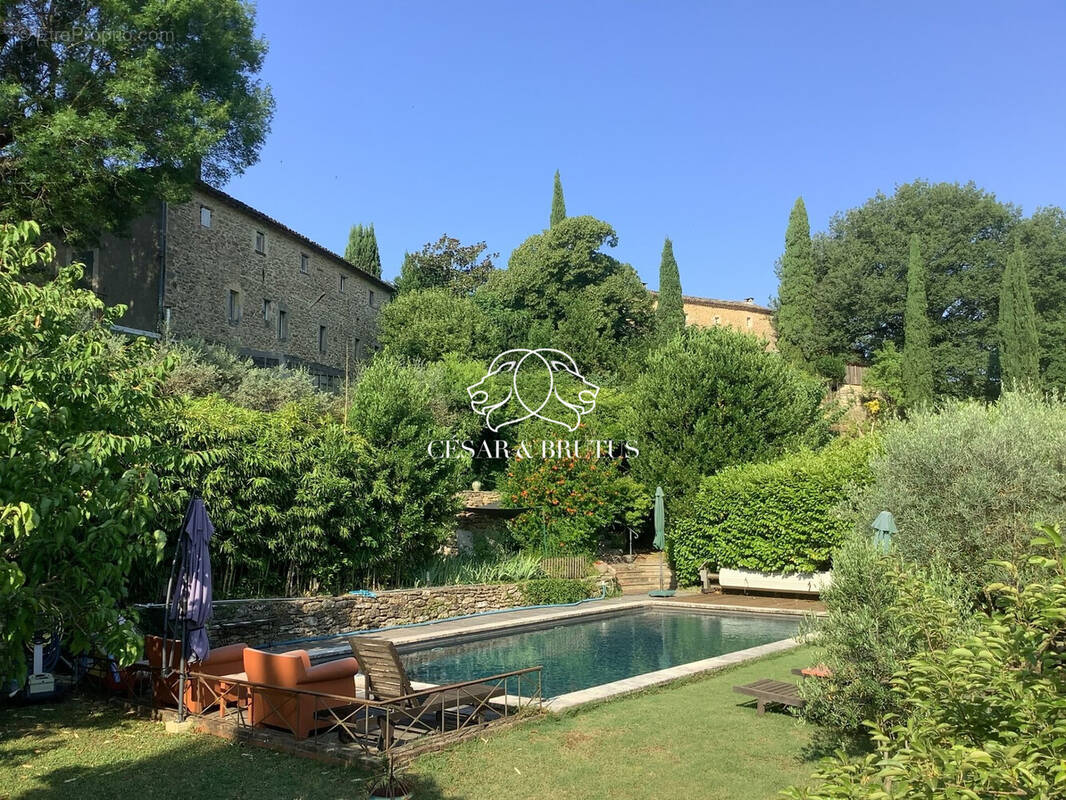 Vue Maison depuis la piscine - Maison à SAINT-ANDRE-DE-ROQUEPERTUIS