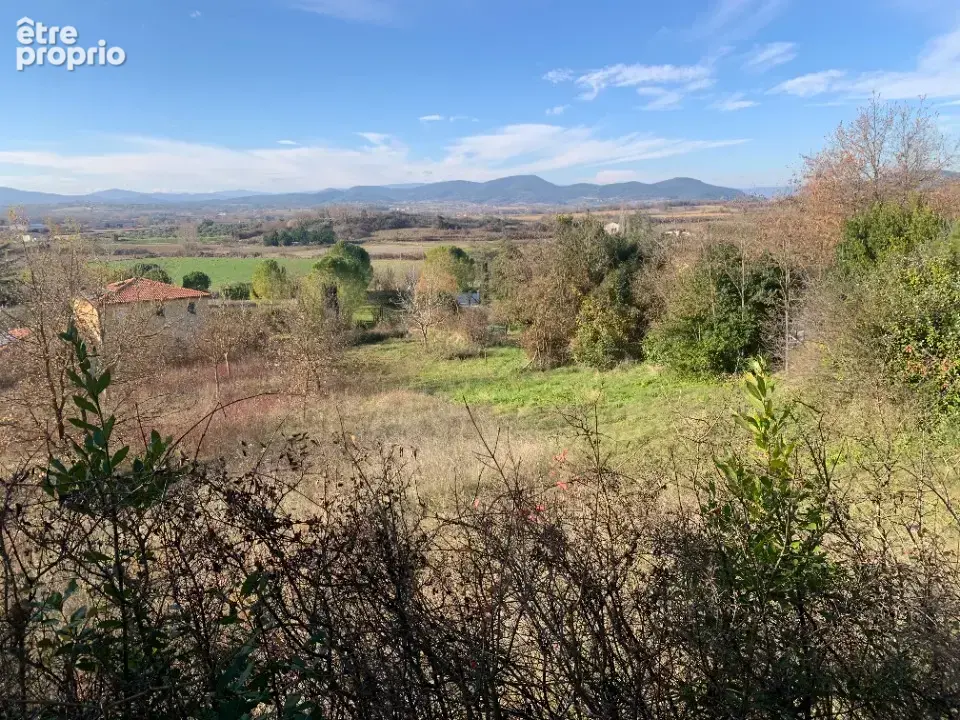 Terrain à SAINT-JEAN-DE-MARUEJOLS-ET-AVEJAN