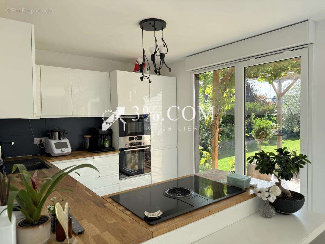 Plain pied de 92 m2 - 3 ch - garage - jardin de 250 m2 - photo 5