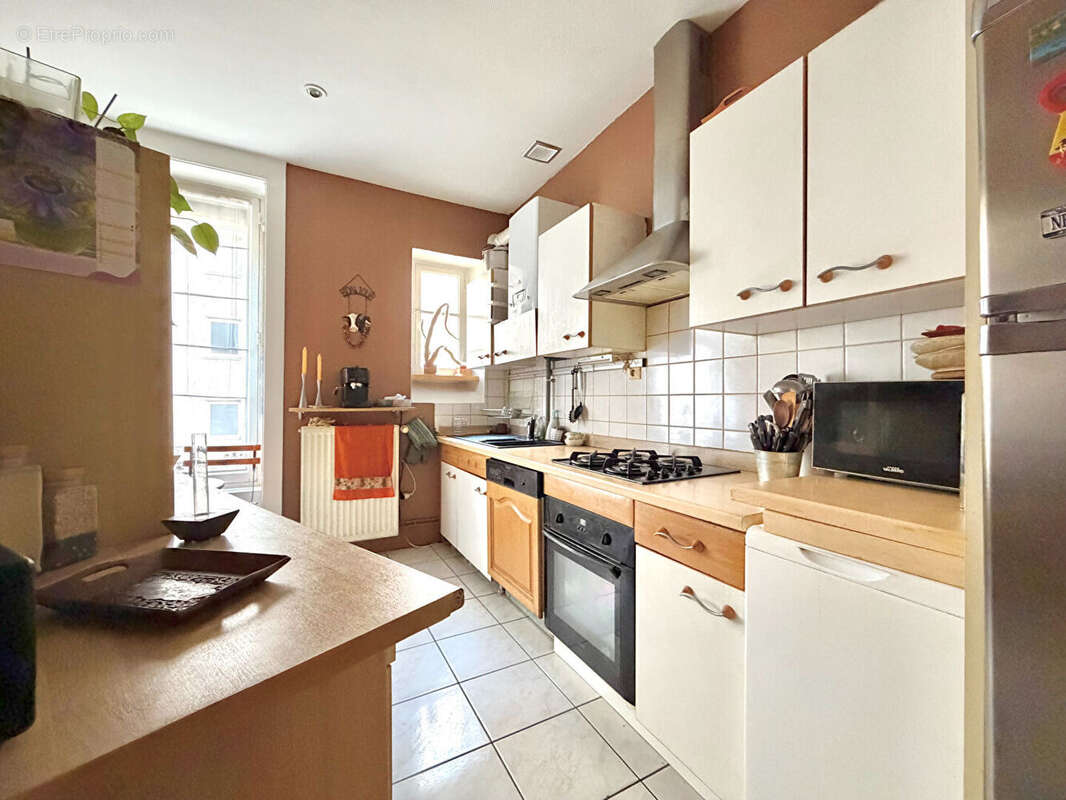 Appartement style haussmannien 113 m2 - photo 4