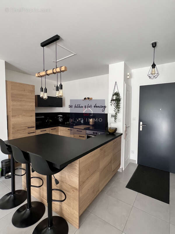Appartement T3 avec terrasse et garage - photo 3
