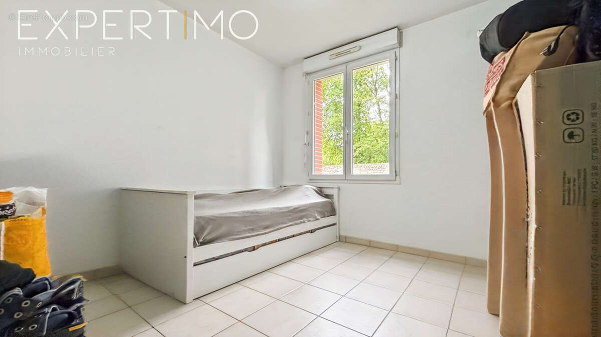 À vendre appartement F3 RDC avec terrasse et deux places de stationnement - photo 8