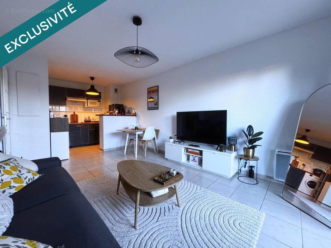 Photo 1 - Appartement à BEAUZELLE