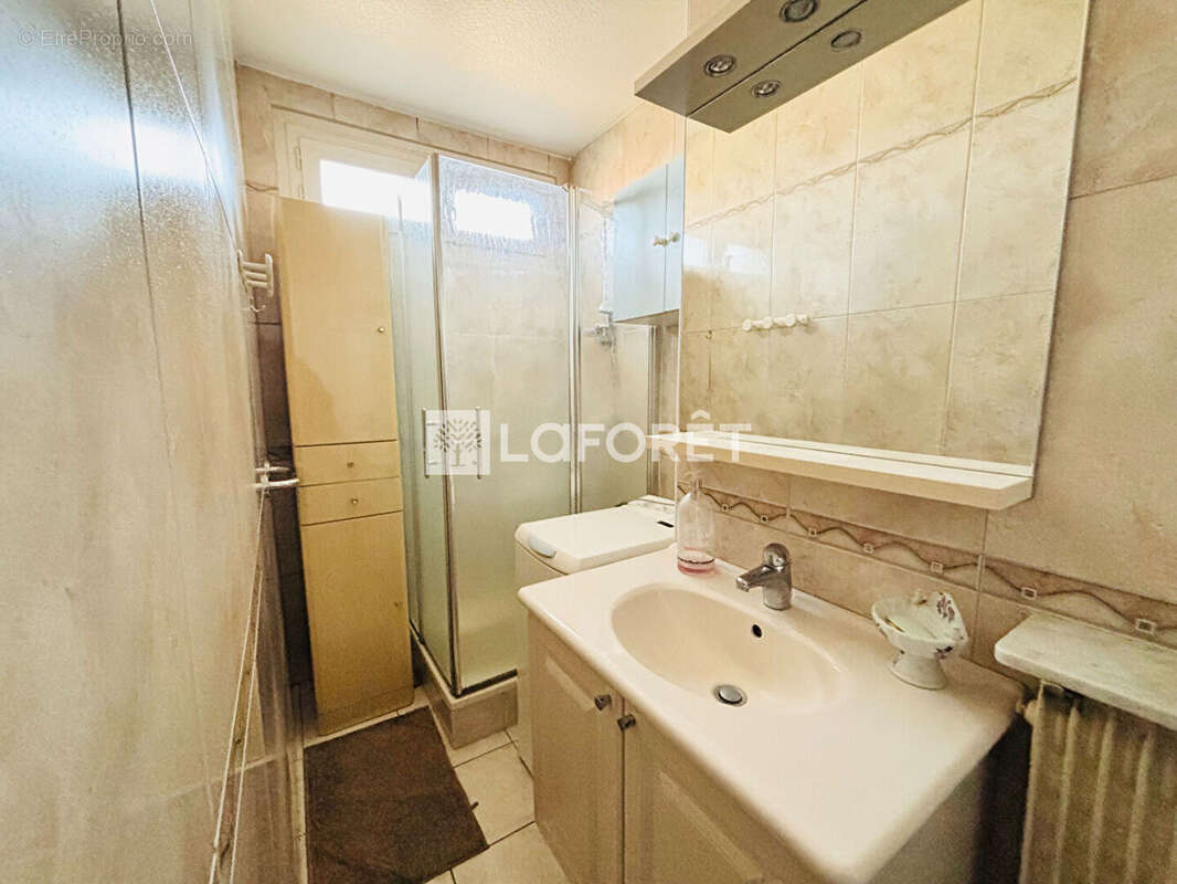 Appartement 3 pièces à vendre à Roanne, 58m² résidence sécurisée, proche commerces et transports. Idéal primo-accédant ou invest - photo 7