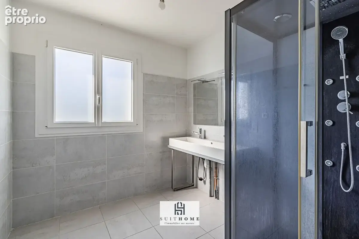 Maison familiale de 131 m² avec sous-sol et double garage - photo 9