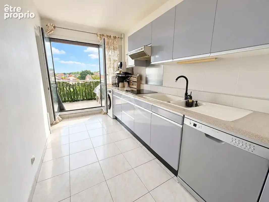 Coup de coeur - vaujours-f2  spacieux avec  terrasse - photo 4