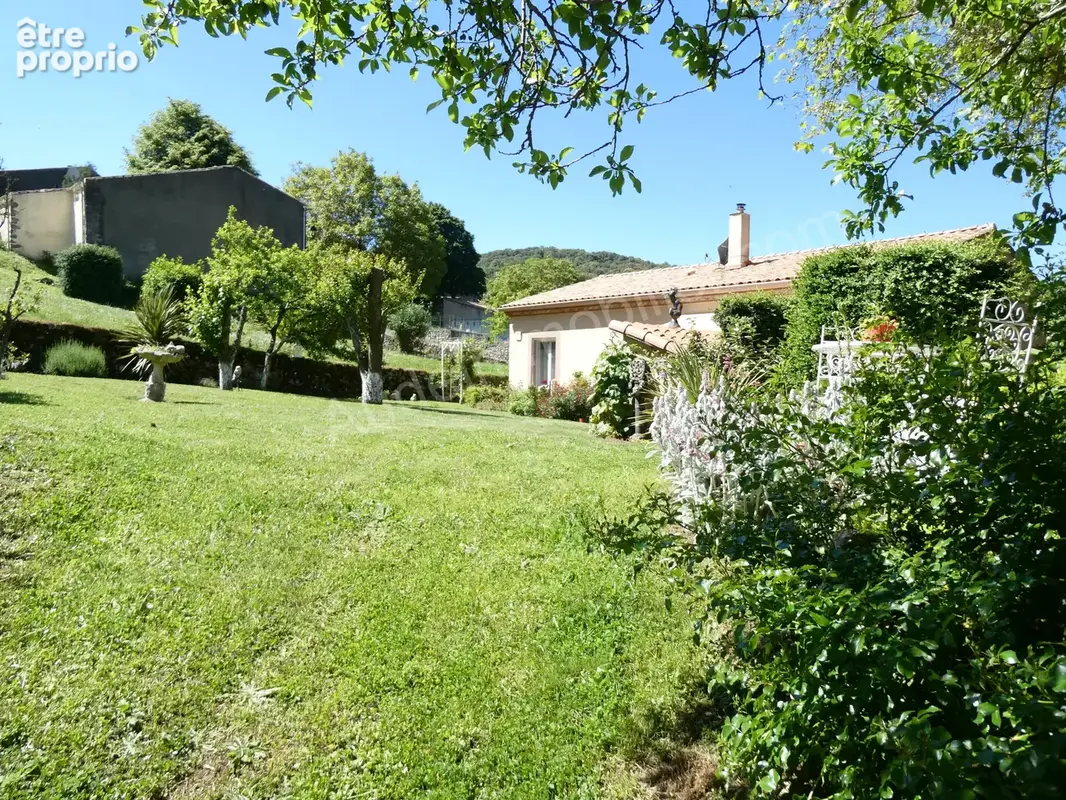 Maison avec garage et jardin - photo 2