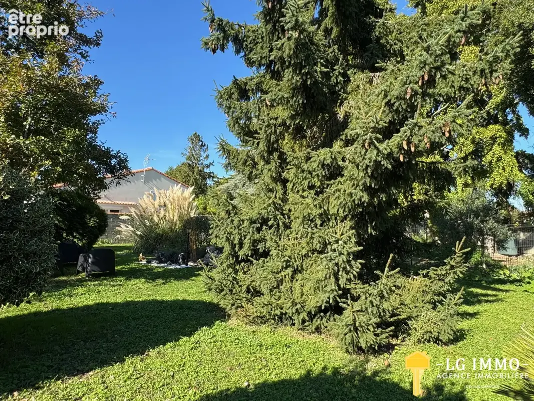 Maison de plain-pied avec jardin et garage en centre ville - photo 46