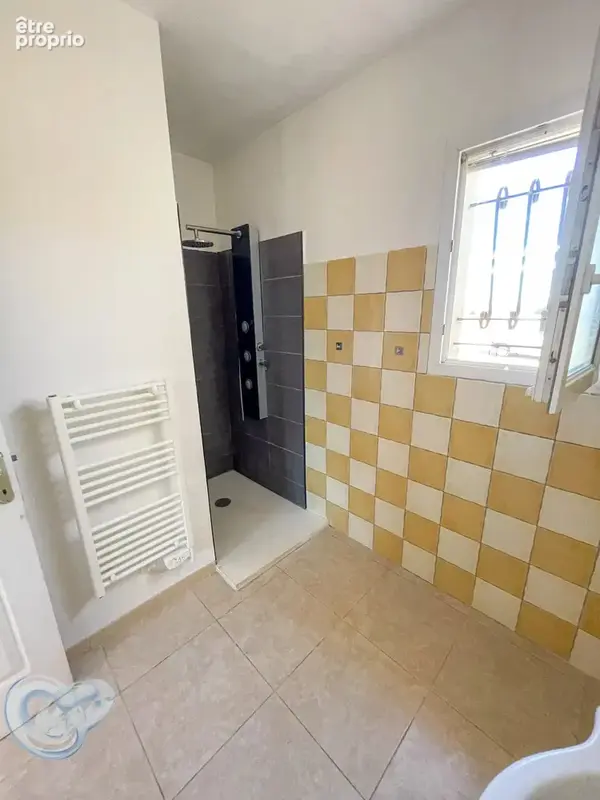 EXCLUSIVITE - Maison de plain-pied de 80 m² habitables avec jardin et garage attenant - photo 13