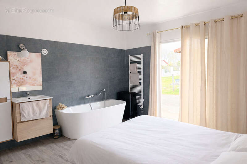 Maison familiale avec double logement – 240 m² – Terrain 1126 m² – Exclusivité - photo 5