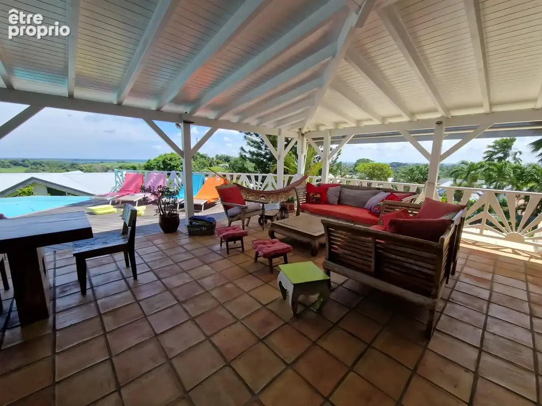 VUE MER Superbe villa de standing + T3 piscine à débordement sur 1000 m² à BAIE MAHAULT (971) - photo 7