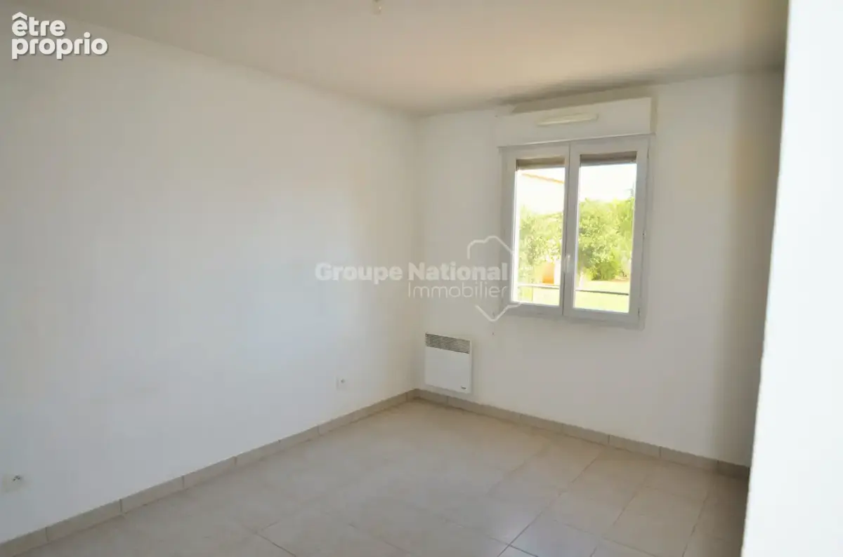 T3 climatisé de 55 m²  avec balcon couvert + garage privatif au sous-sol  dans une copropriété recherchée - photo 4