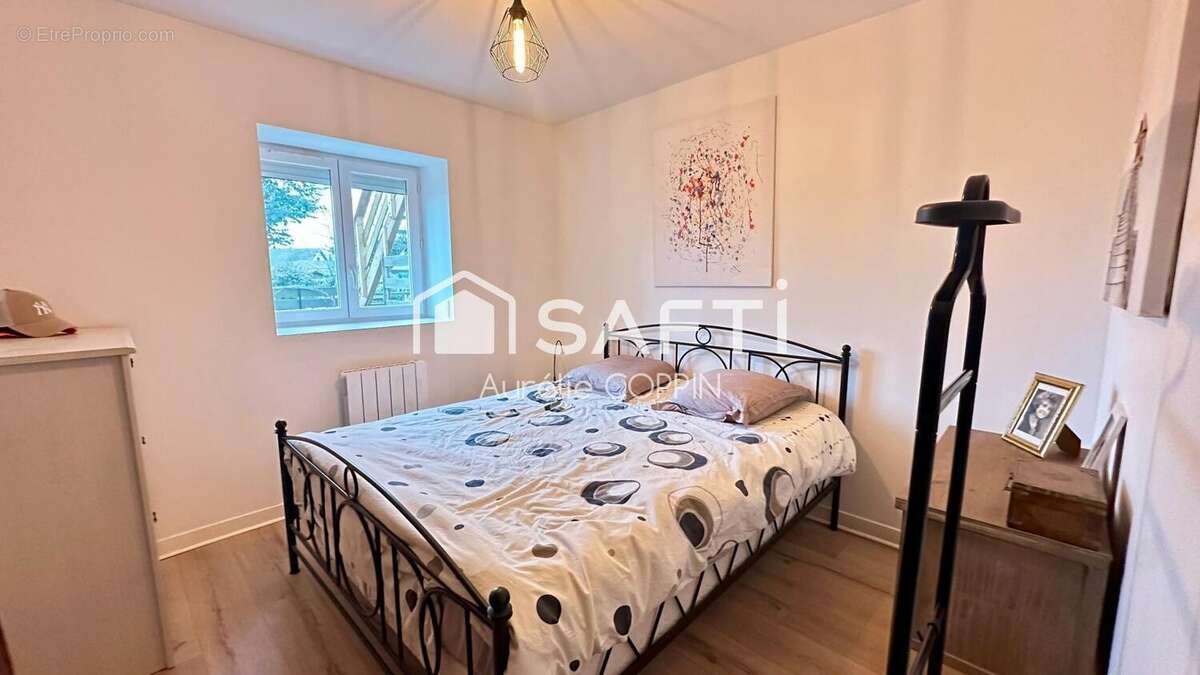Photo 7 - Appartement à SAINT-ROMAIN-DE-JALIONAS