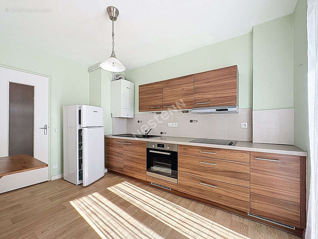 Appartement 2 chambres avec cave et place de parking - photo 3