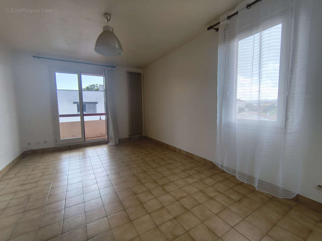 Appartement T3 Ascenseur et stationnement privé - photo 2