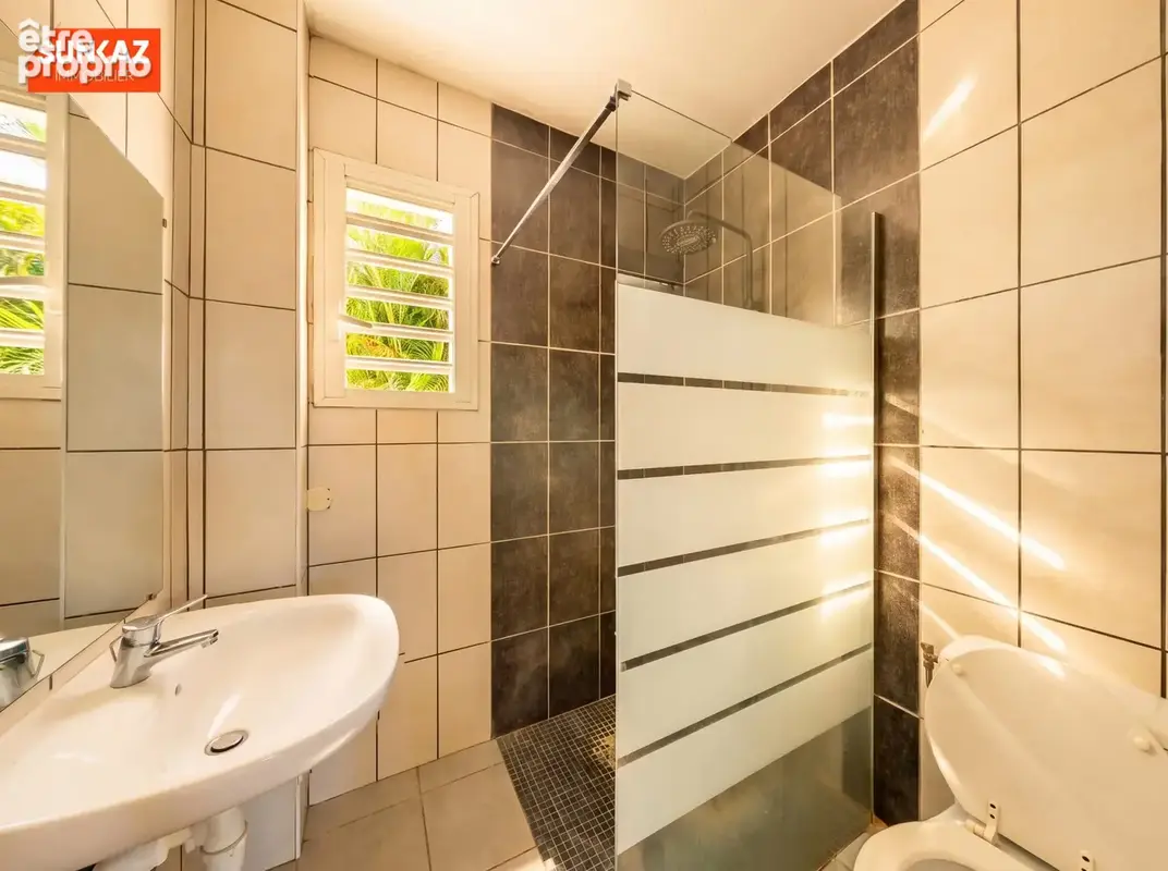 Maison 4 pièces 70 m² à vendre à Saint-Pierre (97410) - photo 5