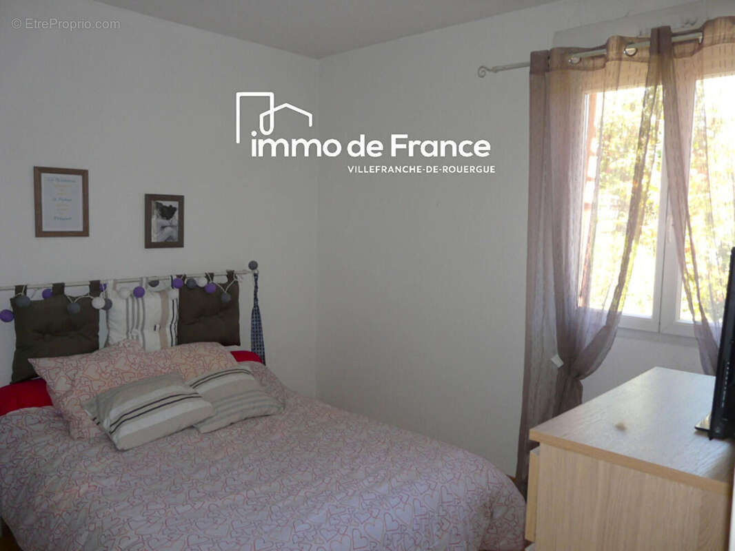 Appartement loué Villefranche De Rouergue 2 pièces, 78 m² avec jardin, garage et parking - photo 7