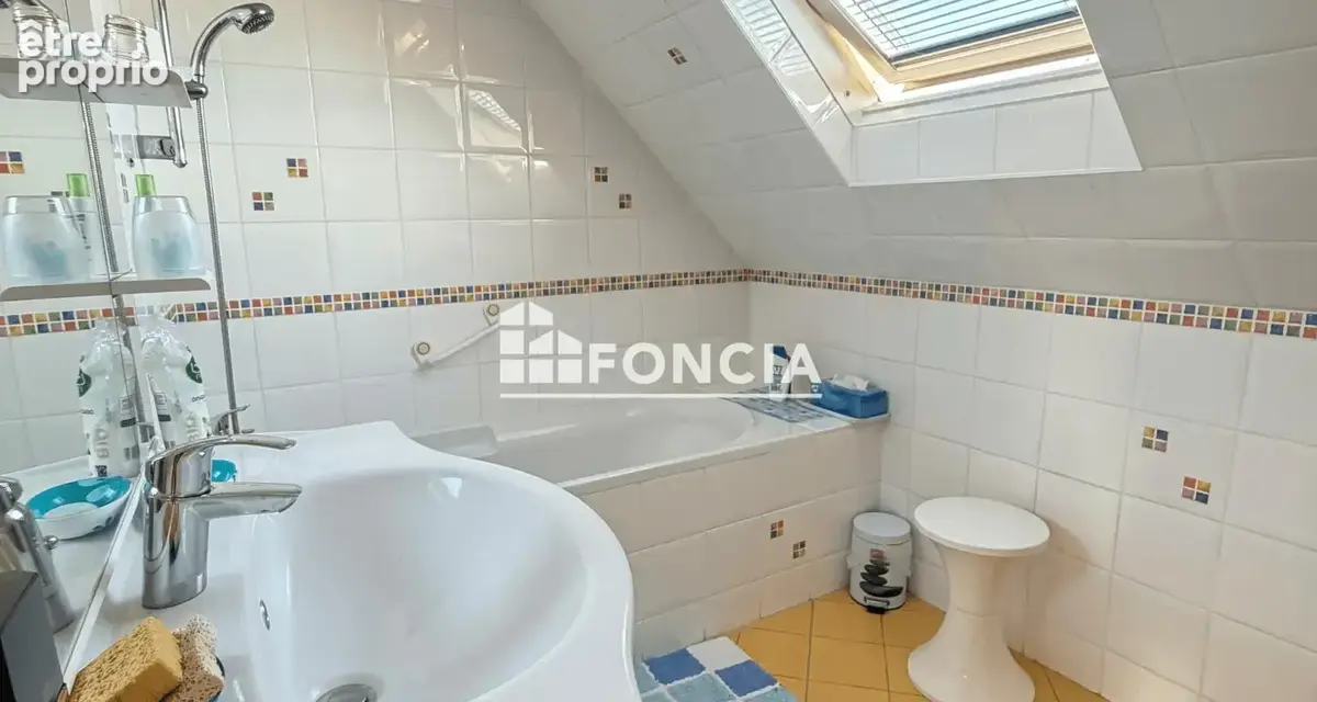 À VENDRE – Maison familiale de 89 m² avec jardin, terrasse et sous-sol total à Saint-Martin-du-Tertre - photo 12